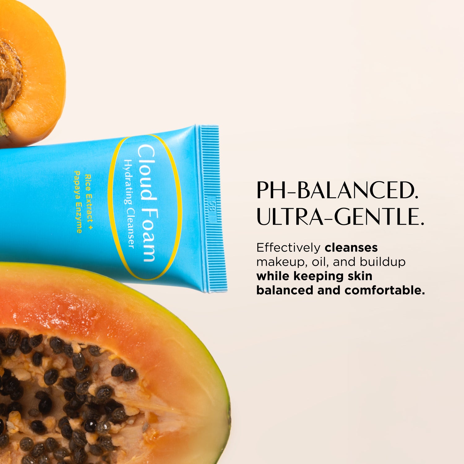 Cloud Foam tube with a papaya on a light background
