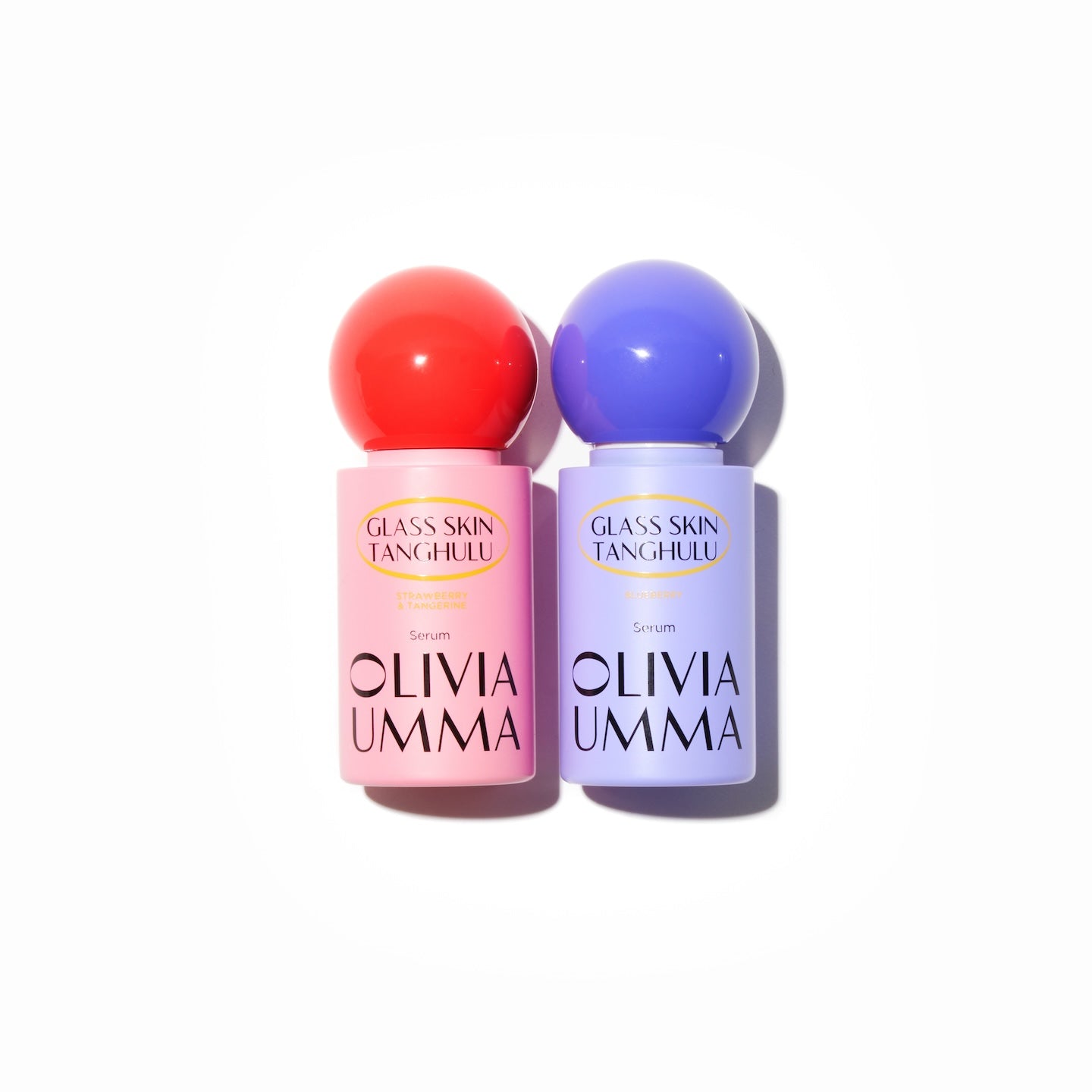 Two bottles of OLIVIAUMMA Glass Skin Tanghulu serum with colorful caps, one pink and one purple, on a light background.