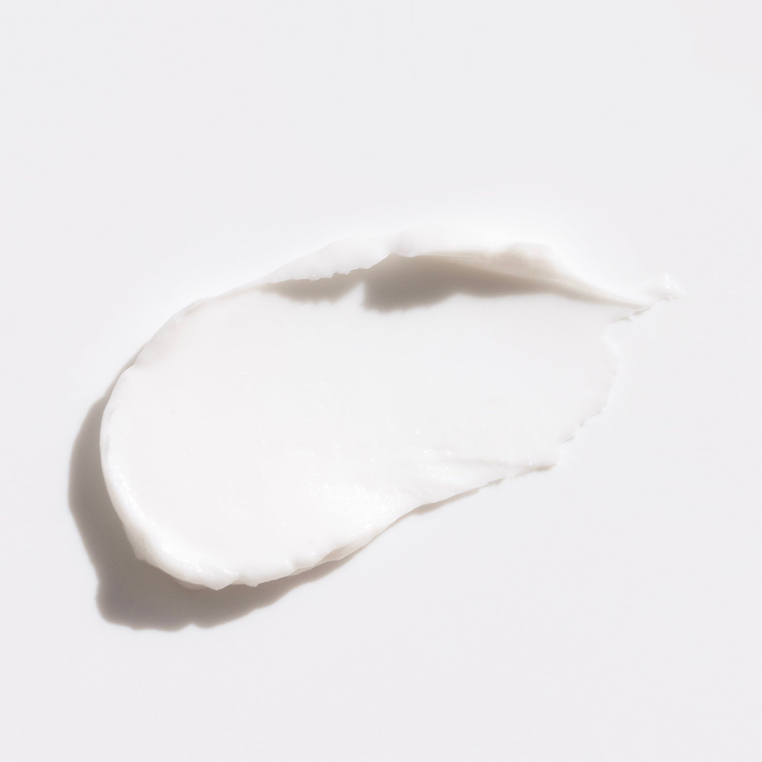 White cream swatch on a light gray background