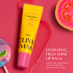 Yellow lip balm tube with pink cap on a pink background, featuring 'Candy Glow' branding.