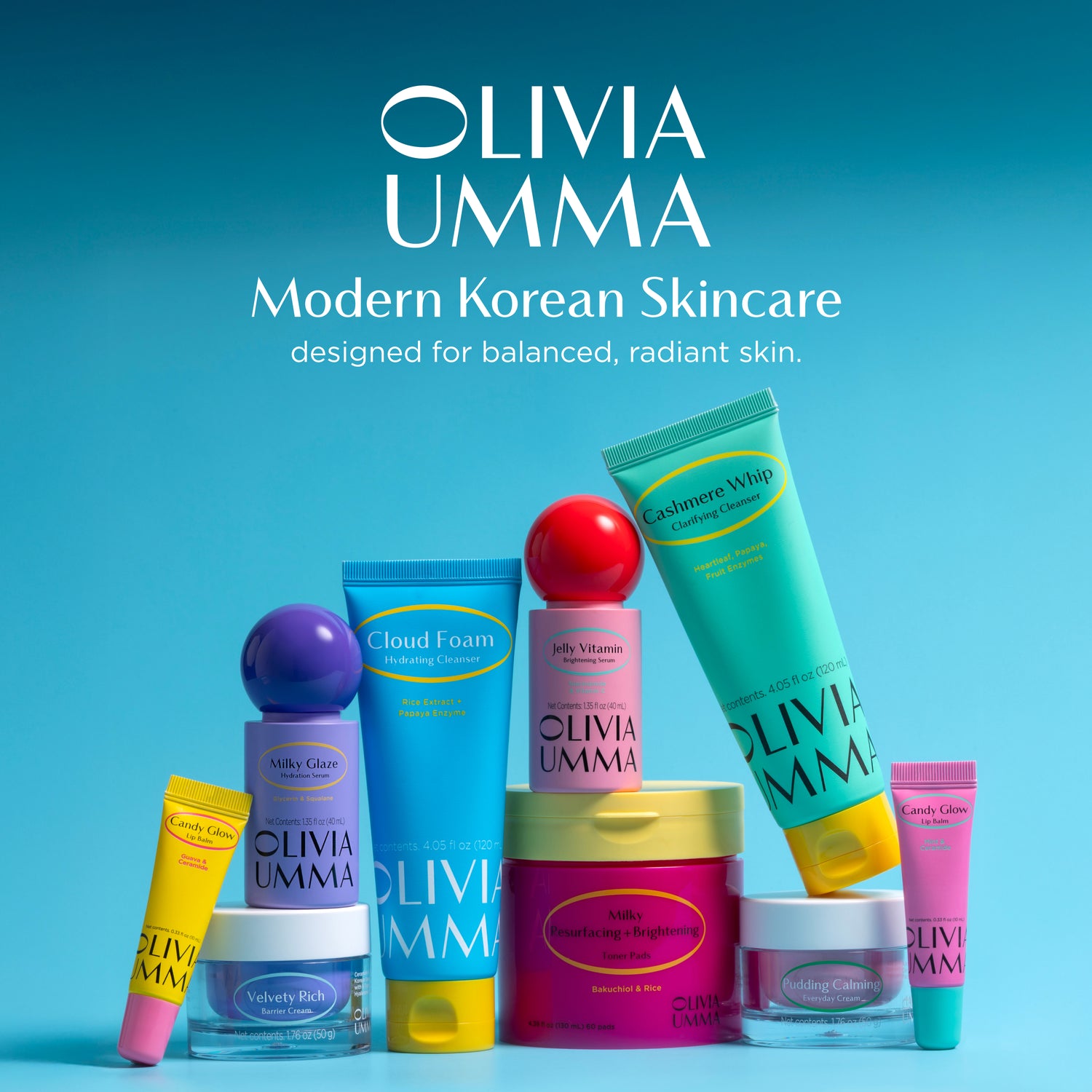 Collection of Olivia Umma skincare products on a blue background with brand name displayed.