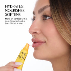 Woman applying a yellow lip balm with text about its hydrating, nourishing, and softening properties.