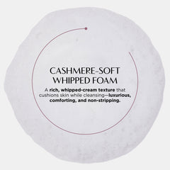 Round container of cashmere-soft whipped foam with text on a white background