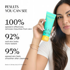 Woman holding a skincare product with statistics on its effectiveness.