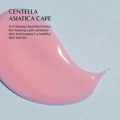 Pink skincare product with text about Centella Asiatica care on a light blue background
