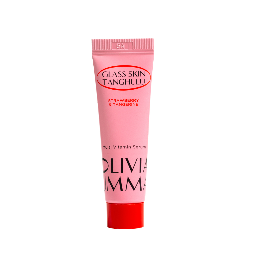 A pink tube of OLIVIAUMMA Glass Skin Tanghulu Strawberry & Tangerine Multi Vitamin Serum with a red cap.